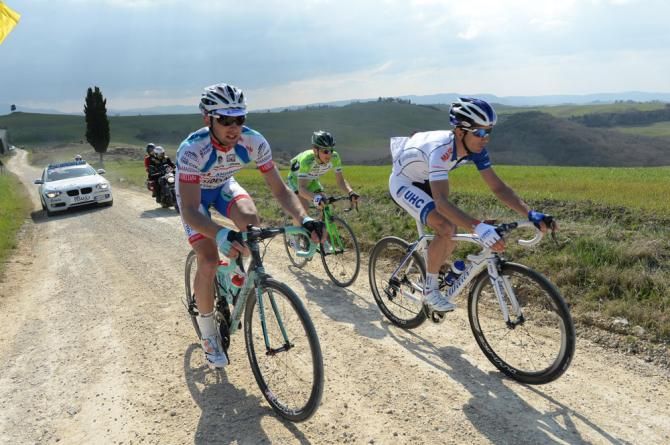 Marco Frapporti (Androni Giocattoli) and Davide Frattini (UnitedHealthcare) ride side-by-side in the early break