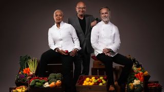 MasterChef: The Professionals 2023 judges Monica Galetti, Gregg Wallace and Marcus Wareing (L-R) surrounded by boxes of fresh ingredients