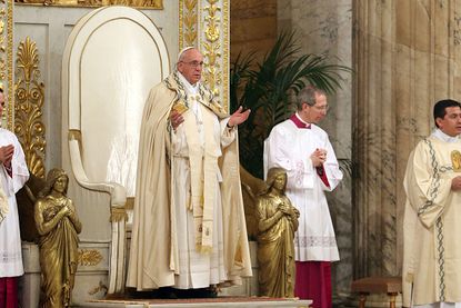 Pope Francis attends a prayer service