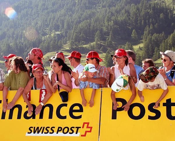 Smacking the barriers is all part of the finish-line frenzy.