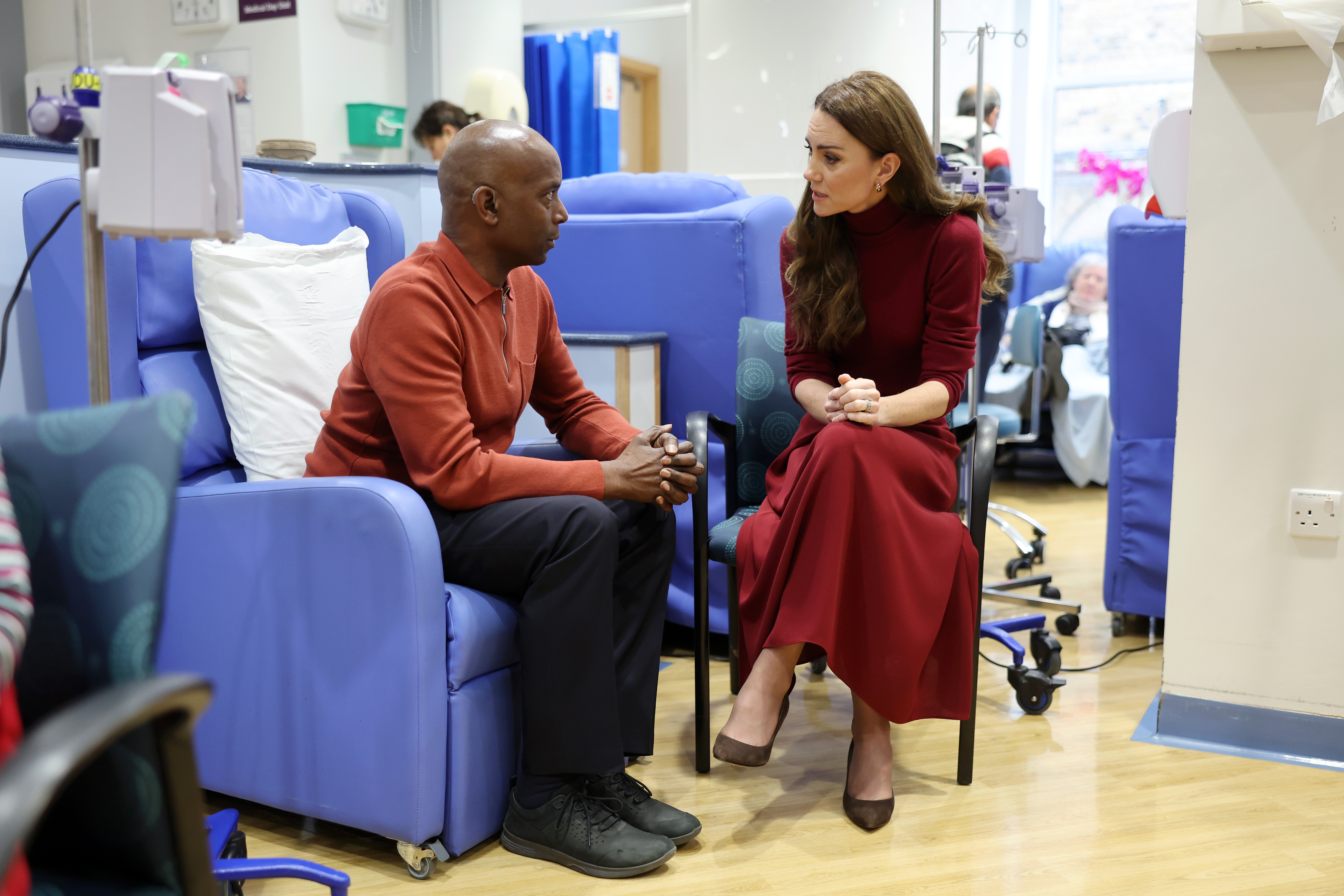 Catherine, Princess of Wales (R) talks with Peter Burton (L), during a visit to The Royal Marsden Hospital on January 14, 2025 in London, England.