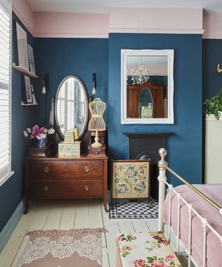 Blue and pink painted walls and vintage furniture in a vintage style bedroom
