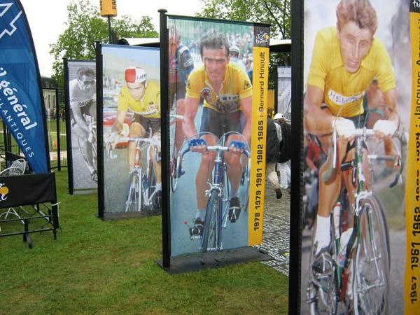 There are huge posters of the Tour winners in the start village.