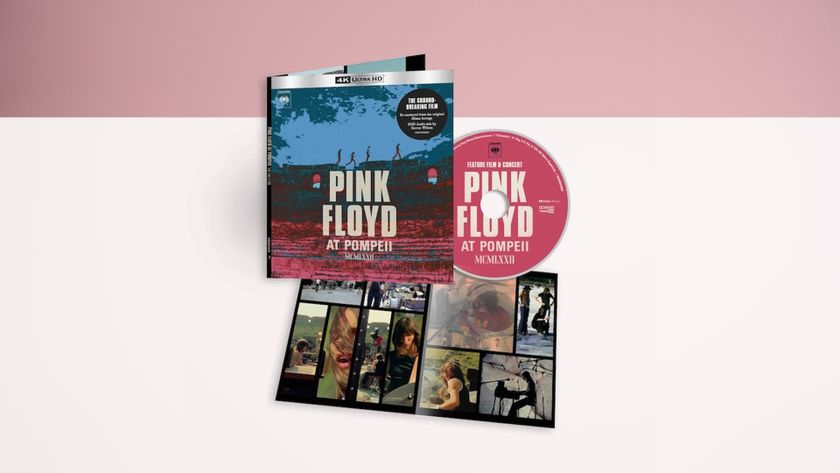 The cover, disc and insert for Pink Floyd Live at Pompeii, on a white surface with a pink wall behind