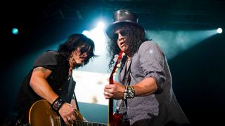 Gilby Clarke and Slash during the Kings of Chaos concert on June 16, 2013 in Sun City, South Africa