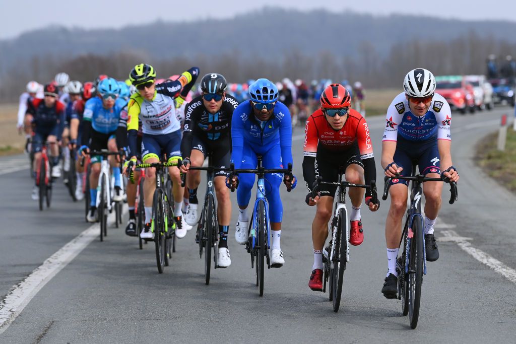 MILAN ITALY MARCH 16 LR Simone Petilli of Italy and Team Intermarch Wanty Gobert Matriaux Lorenzo Milesi of Italy and Team DSM Tsgabu Gebremaryam Grmay of Ethiopia and Team Bikeexchange Jayco Miguel Eduardo Florez Lopez of Colombia and Team Arka Samsic and Pieter Serry of Belgium and Team QuickStep Alpha Vinyl lead The Peloton during the 103rd MilanoTorino 2022 a 197km one day race from Magenta to Rivoli MilanoTorino on March 16 2022 in Milan Italy Photo by Tim de WaeleGetty Images