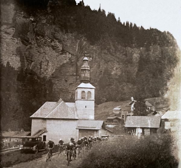 This photo shows the peloton climbing out of a village in the mountains. It&rsquo;s believed this is one of the Pyrenean towns on the route to the Col du Tourmalet. This decisive ninth stage saw the French rider Andr&eacute; Leducq take the leaders yellow jersey from Learco Guerra (Ita). It was acknowledged as one of the toughest stages in the 1930 Tour de France.