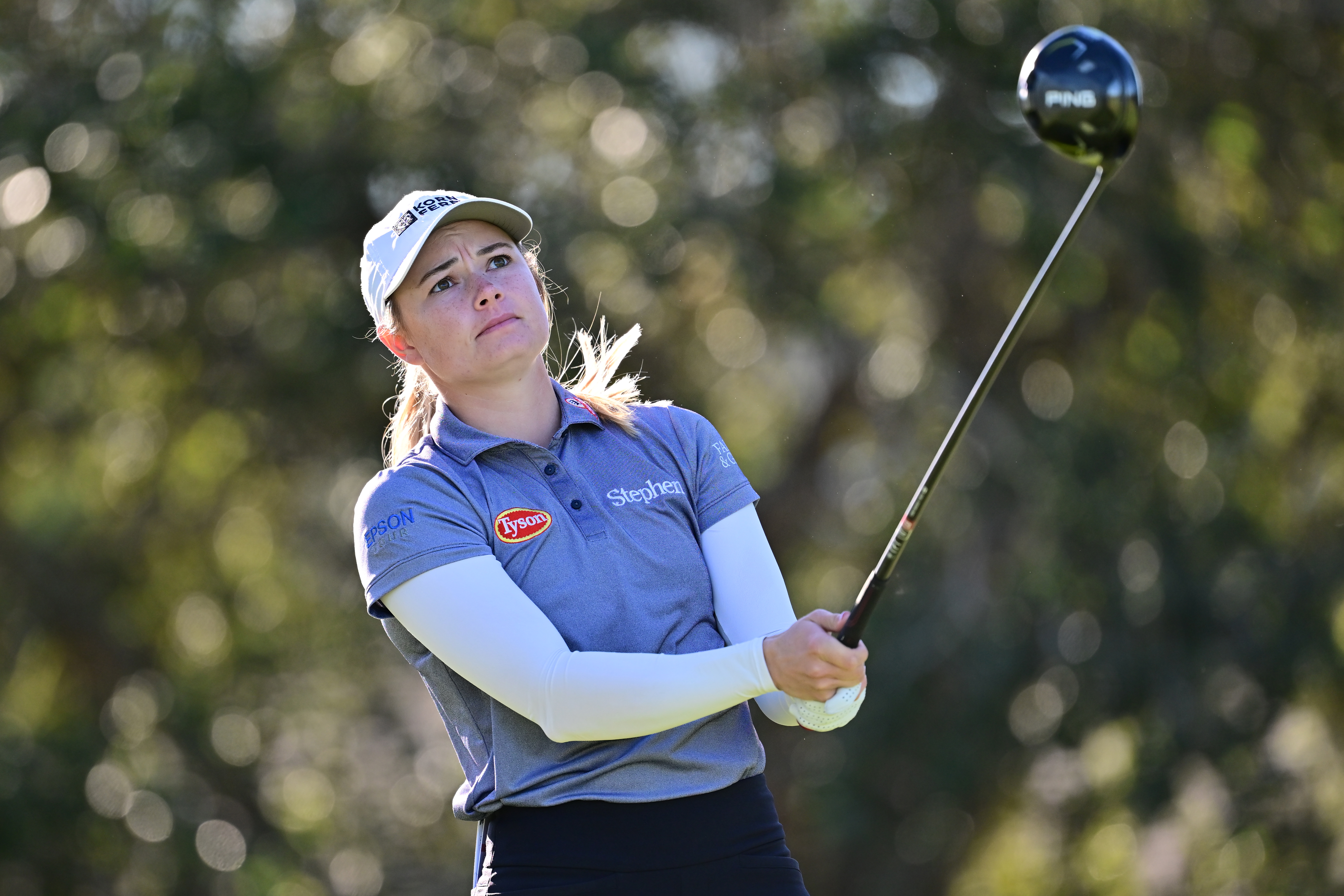 Brooke Matthews looks at her ball after a drive at The Annika in 2025