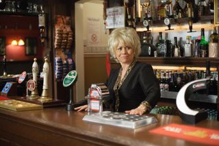 EastEnders - Peggy Mitchell behind the Queen Vic bar