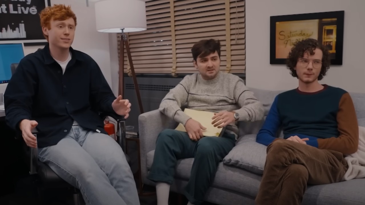 From left to right: Ben Marshall sitting in an office chair, John Higgins, and Martin Herlihy sitting on a couch.