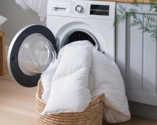 Fine bedding company white comforter in washer dryer