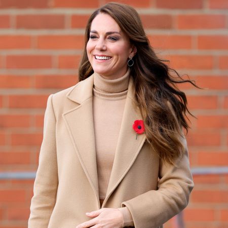 Kate Middleton wears a camel coat