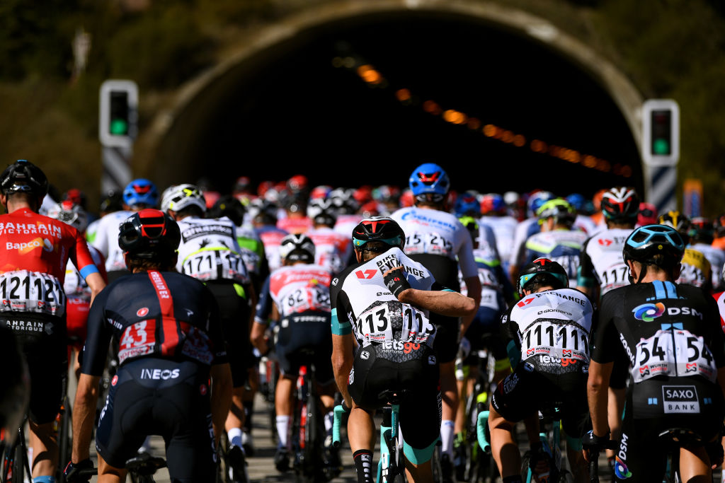 VALLTER 2000 SETCASES VALL CAMPRODON SPAIN MARCH 24 Tanel Kangert of Estonia and Team BikeExchange the peloton during the 100th Volta Ciclista a Catalunya 2021 Stage 3 a 2031km stage from Canal Olmpic de Catalunya to Vallter 2000 Setcases Vall Camprodon 2125m Tunnel Detail view Shadow Landscape VoltaCatalunya100 on March 24 2021 in Vallter 2000 Setcases Vall Camprodon Spain Photo by David RamosGetty Images