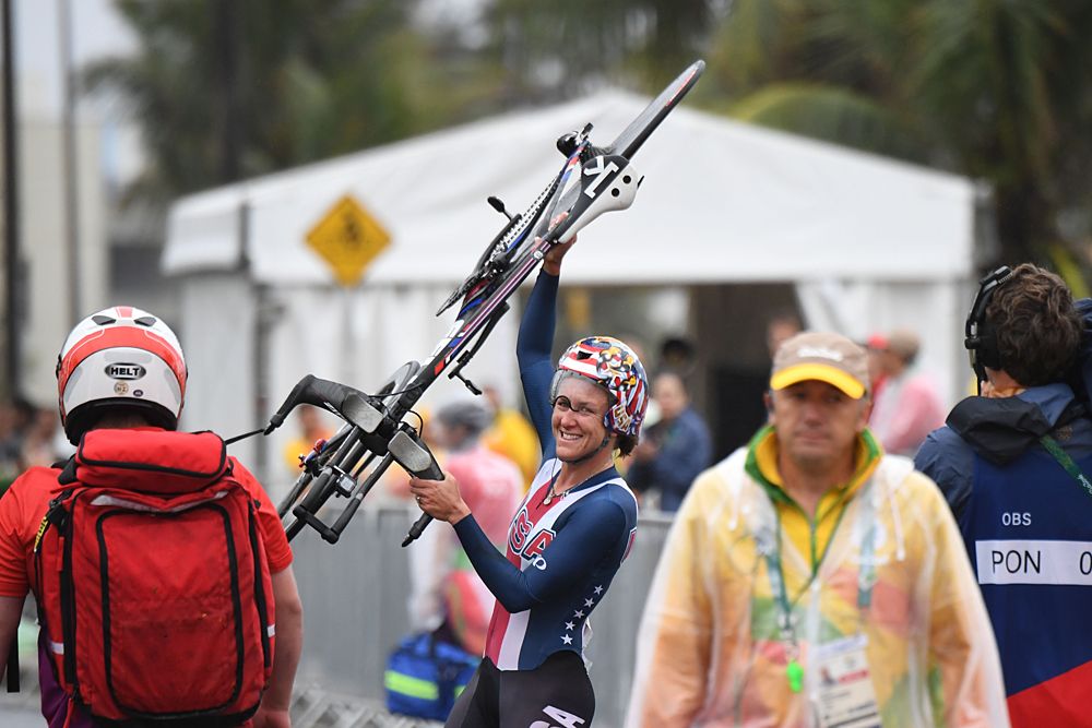 Kristin Armstrong celebrates her third gold medal