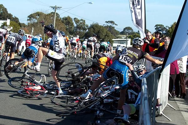 A tangle of riders and bikes after a pile-up near the finish line in Wonthaggi.