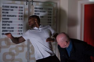 Phil Mitchell punches Vincent Hubbard in EastEnders
