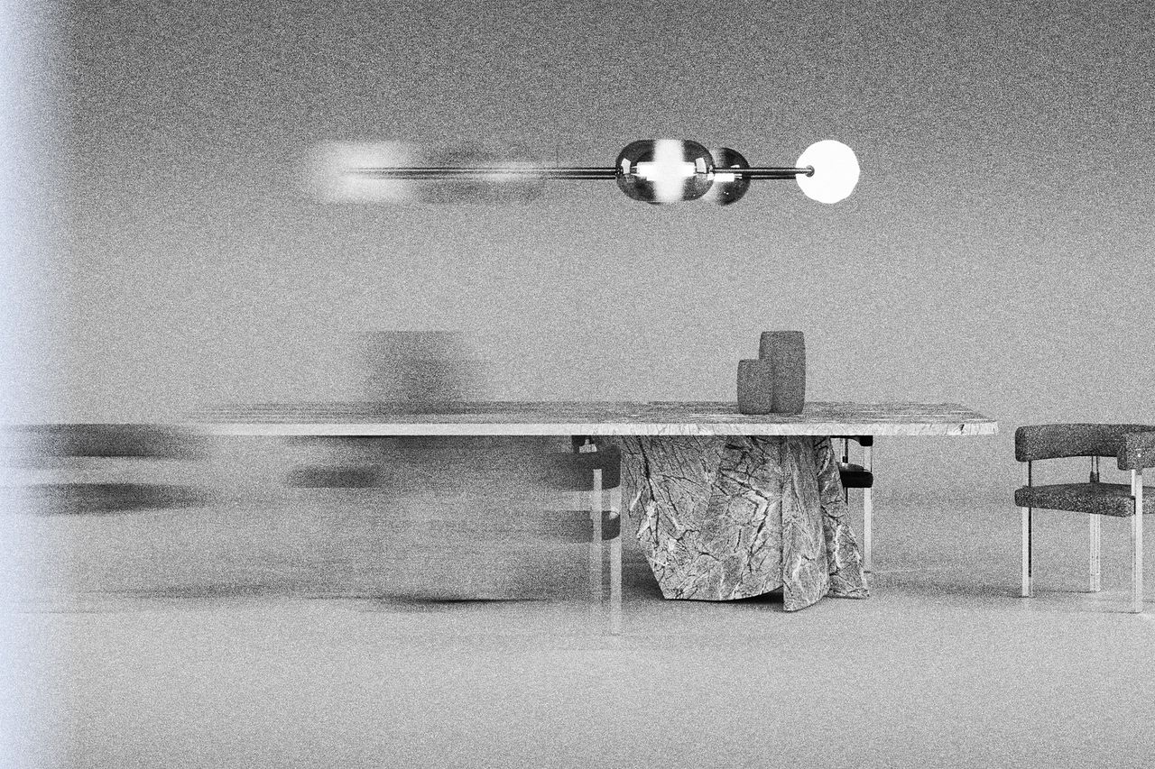 Christophe Delcourt's new table for Baxter has legs that unfold like the pages of a book