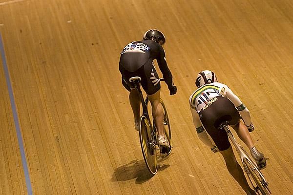 Edward Dawkins (New Zealand) keeps a close watch on Peter Lewis (Australia) during a heat of the men's sprint.