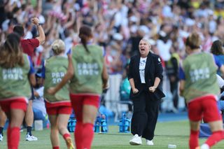 PARIS, FRANCE - AUGUST 10: Emma Hayes, Head Coach of Team United States celebrates after Mallory Swanson #9 of Team United States (not pictured) scores her team's first goal during the Women's Gold Medal match between Brazil and United States of America during the Olympic Games Paris 2024 at Parc des Princes on August 10, 2024 in Paris, France. (Photo by Carl Recine/Getty Images)