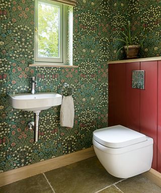cloakroom with wallpaper