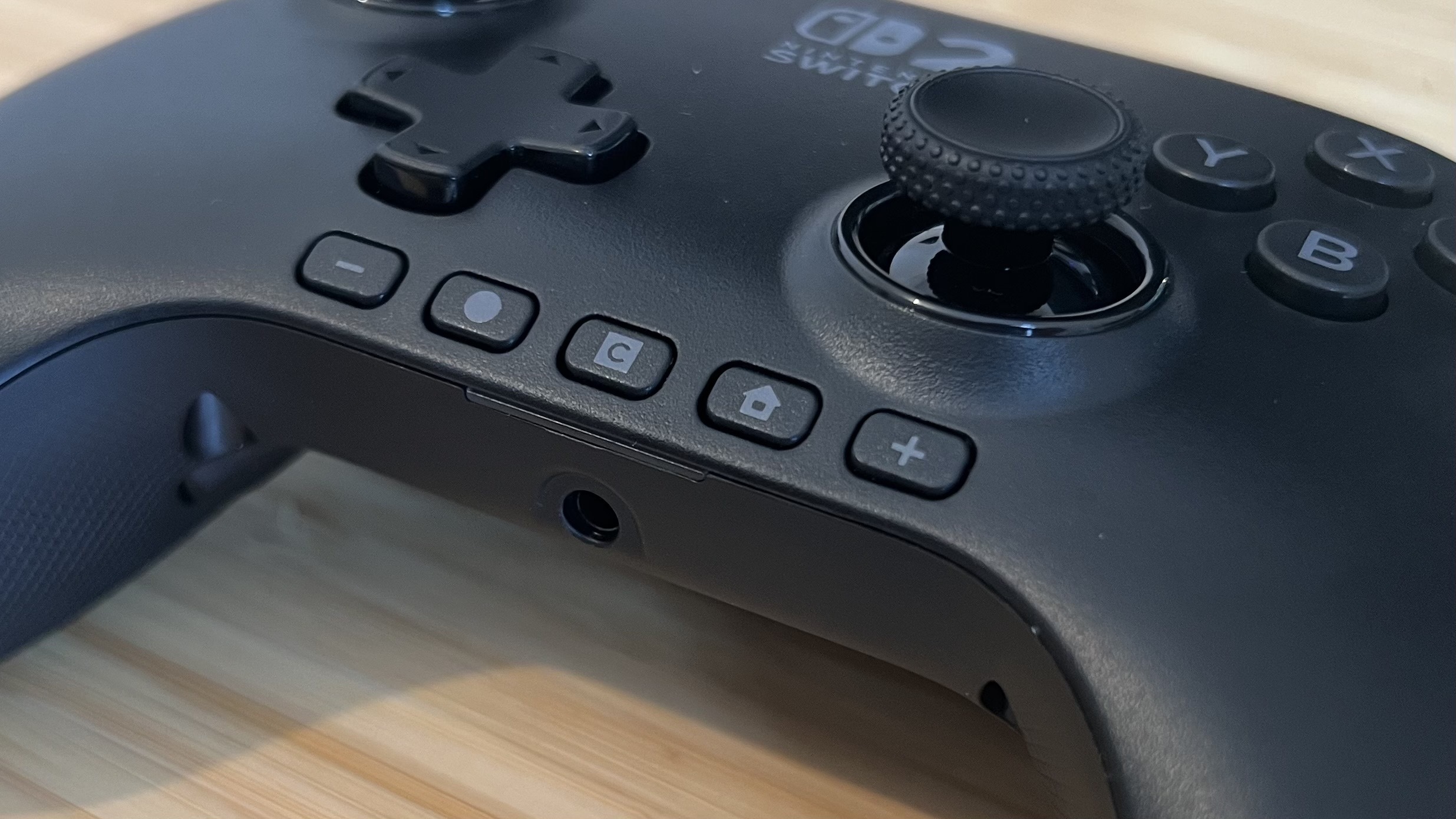Close up on navigation buttons at the bottom of PowerA Advantage Nintendo Switch 2 Controller
