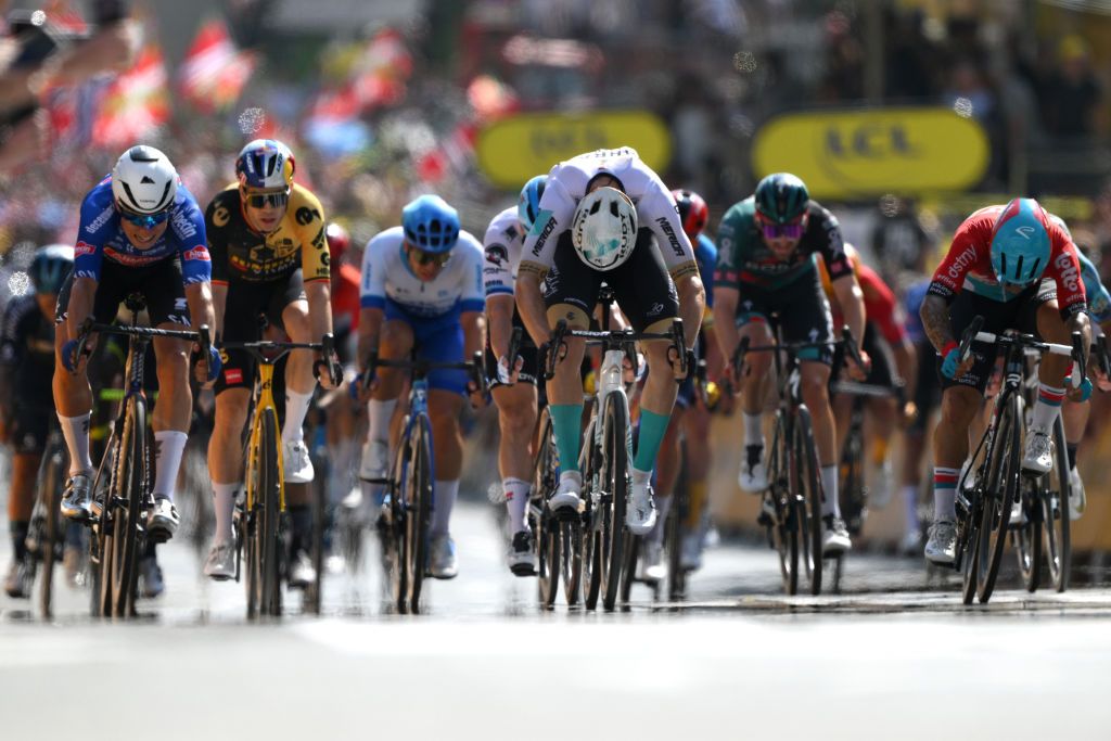 BAYONNE FRANCE JULY 03 LR Jasper Philipsen of Belgium and Team AlpecinDeceuninck Wout Van Aert of Belgium and Team JumboVisma Phil Bauhaus of Germany and Team Bahrain Victorious and Caleb Ewan of Australia and Team Lotto Dstny sprint at finish line during the stage three of the 110th Tour de France 2023 a 1935km stage from AmorebietaEtxano to Bayonne UCIWT on July 03 2023 in Bayonne France Photo by David RamosGetty Images