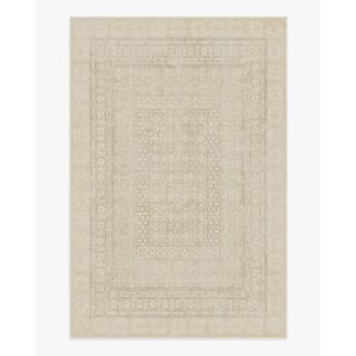 beige rug with subtle pattern