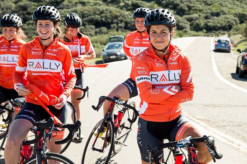 The team pauses for a brief moment to put on jackets for a descent down to the coast.