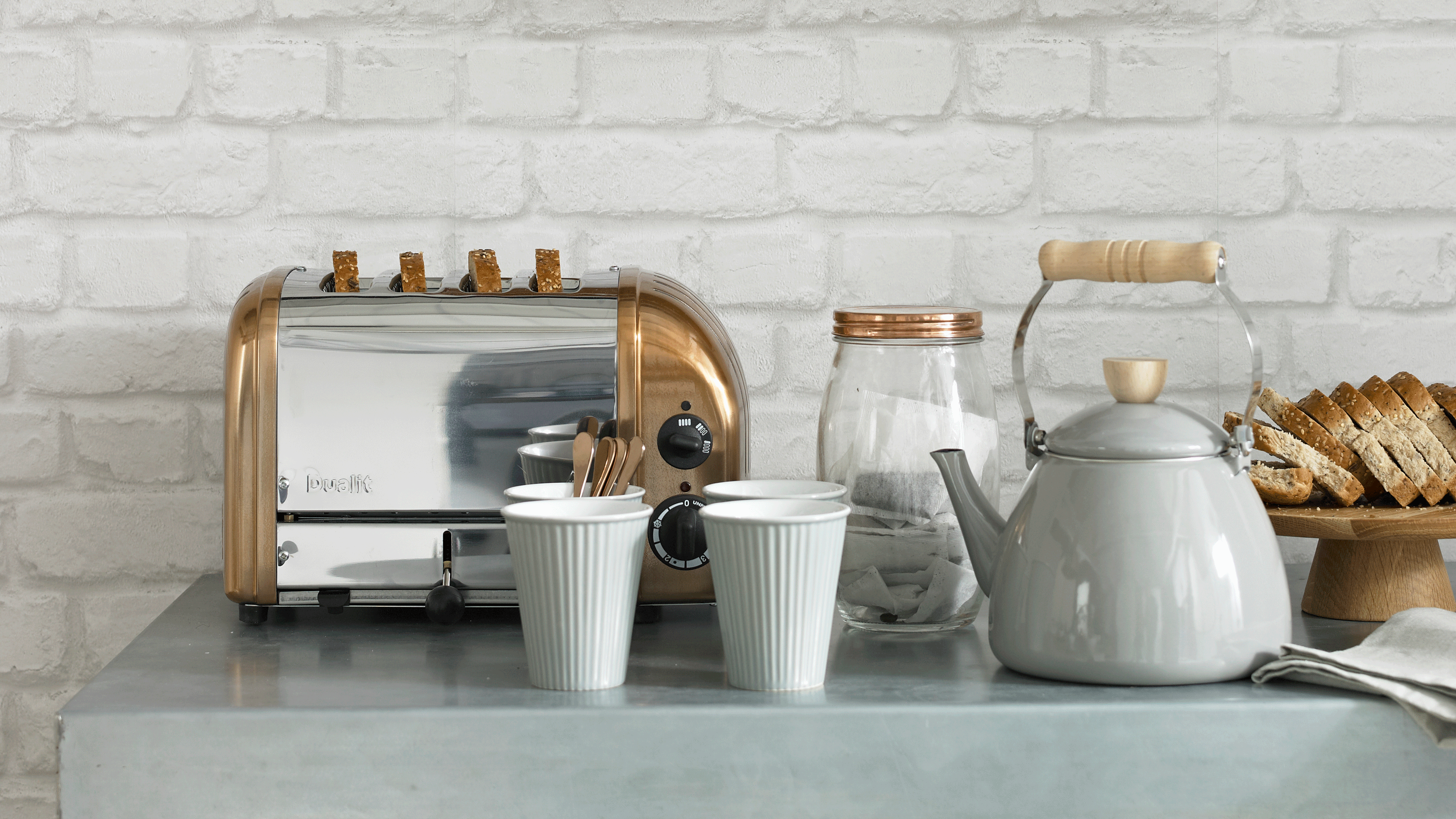 Kettle and toaster with mugs