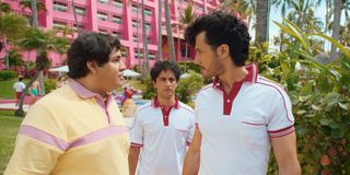 (L to R) Fernando Carsa, Enrique Arrizon and Rafael Cebrián talking near a hotel pool in Acapulco