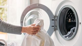 a woman washing clothes