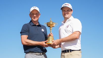 European Ryder Cup Captain, Luke Donald and 2023 United States Ryder Cup Captain, Zach Johnson pose with the Ryder Cup trophy