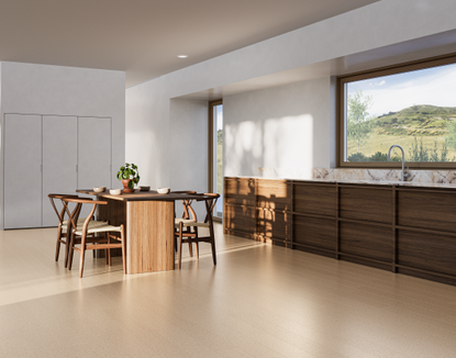 A modern open plan kitchen with dining set and light cork flooring