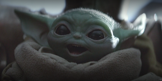 the mandalorian baby yoda smiling