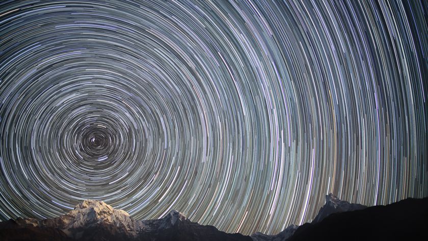 A series of lights in concentric circles show the rotation of the night sky as Earth spins on its axis