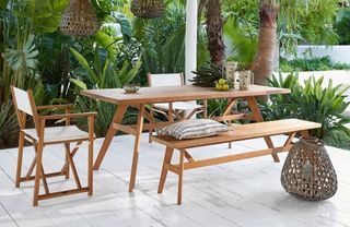 A wooden outdoor dining table and chairs