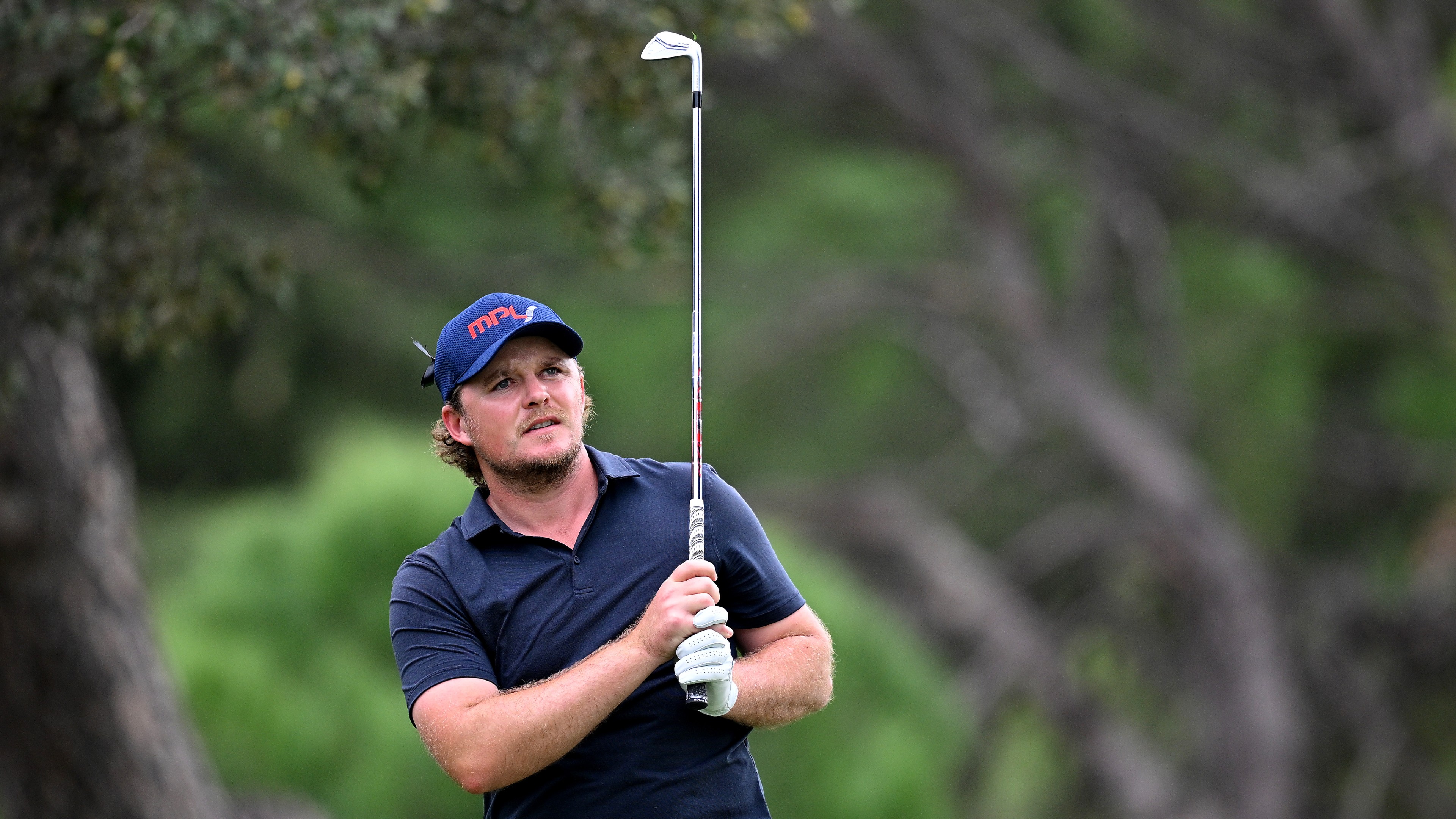 Eddie Pepperell of England plays a shot on the 15th hole on Day Four of the acciona Open de Espana presented by Madrid at Club de Campo Villa de Madrid