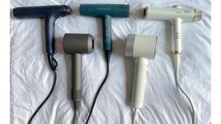 A selection of the quietest hair dryers tested for this feature, including Bio:Ionic, Dyson, mdlondon, Zuvi and Beauty Works