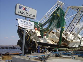 A shrimp boat on a fuel dock, following Hurricane Rita in Port Arthur, Texas.