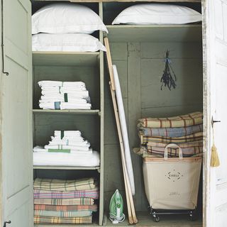 cupboard with pillow and screw blanket