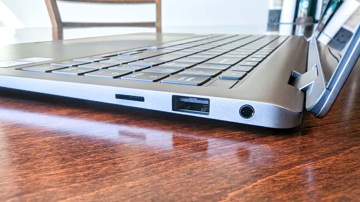 Samsung Galaxy Book5 Pro 360's left ports, which are a microSD card reader, USB-A port, and headphone jack.