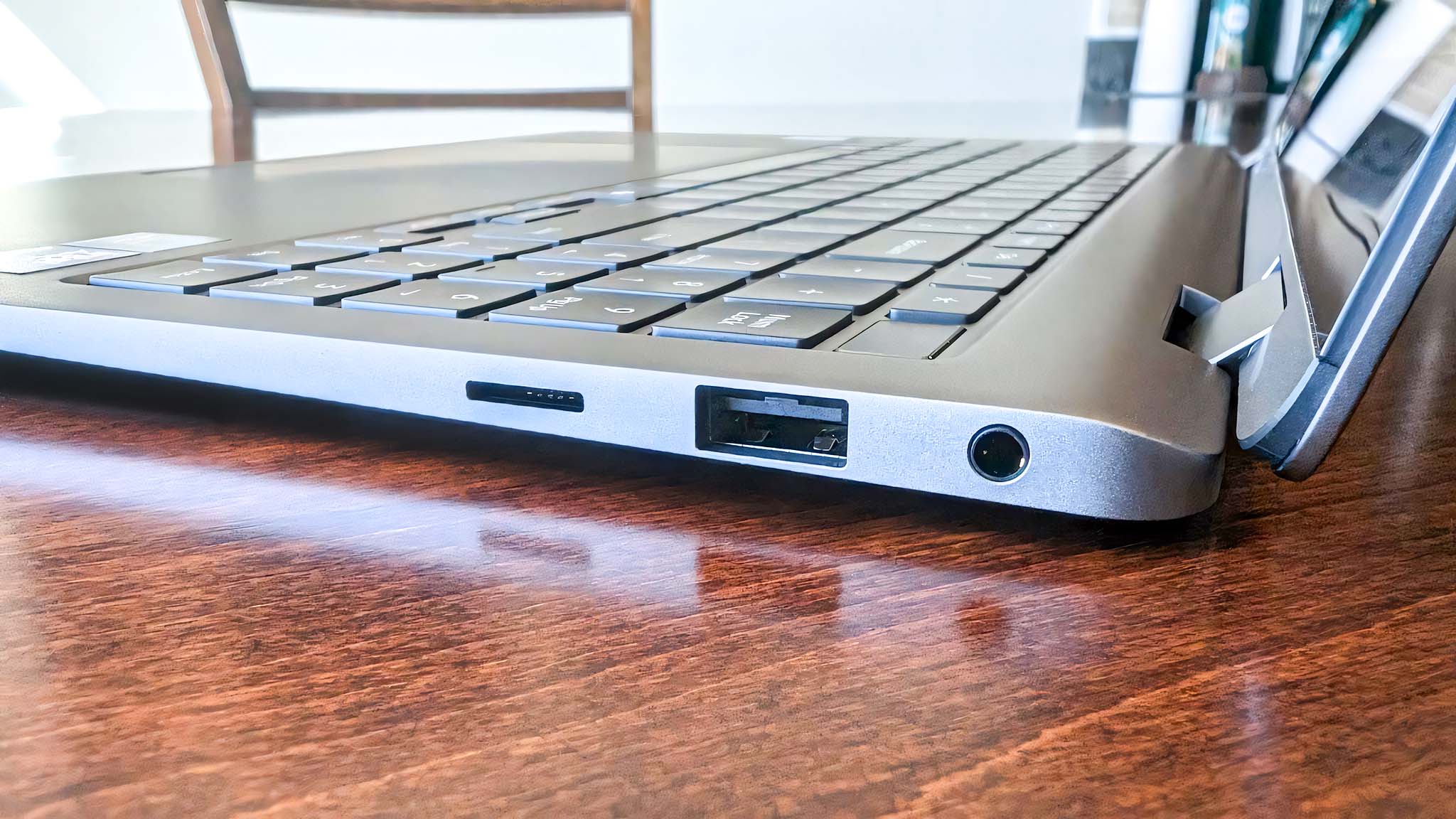 Samsung Galaxy Book5 Pro 360's left ports, which are a microSD card reader, USB-A port, and headphone jack.