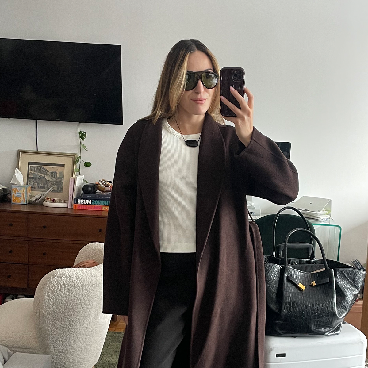 Anna LaPlaca wearing travel-friendly pants that aren't leggings