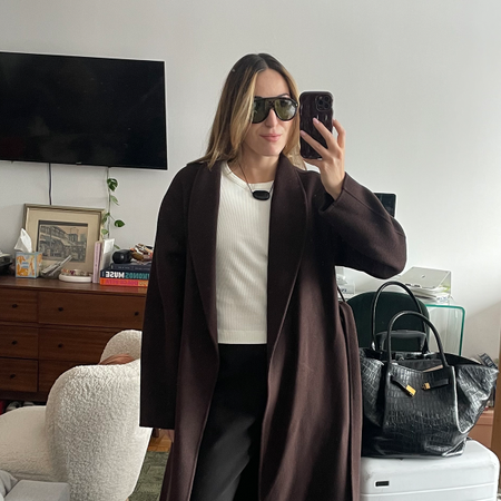 Anna LaPlaca wearing travel-friendly pants that aren't leggings