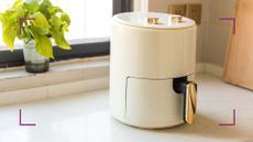 picture of white air fryer on top of kitchen counter