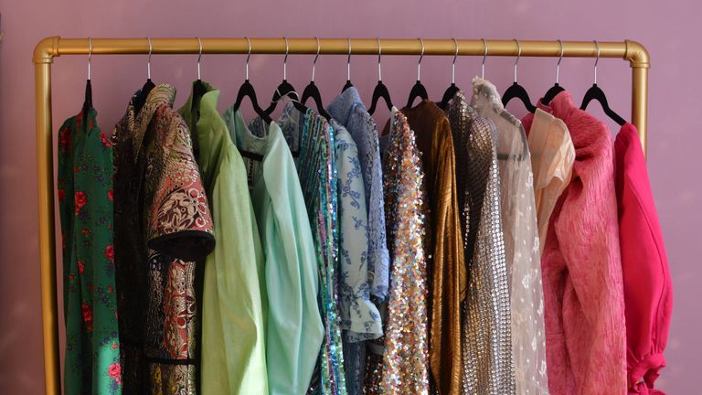 A rail of designer dresses that you could expect to hire from dress rentals