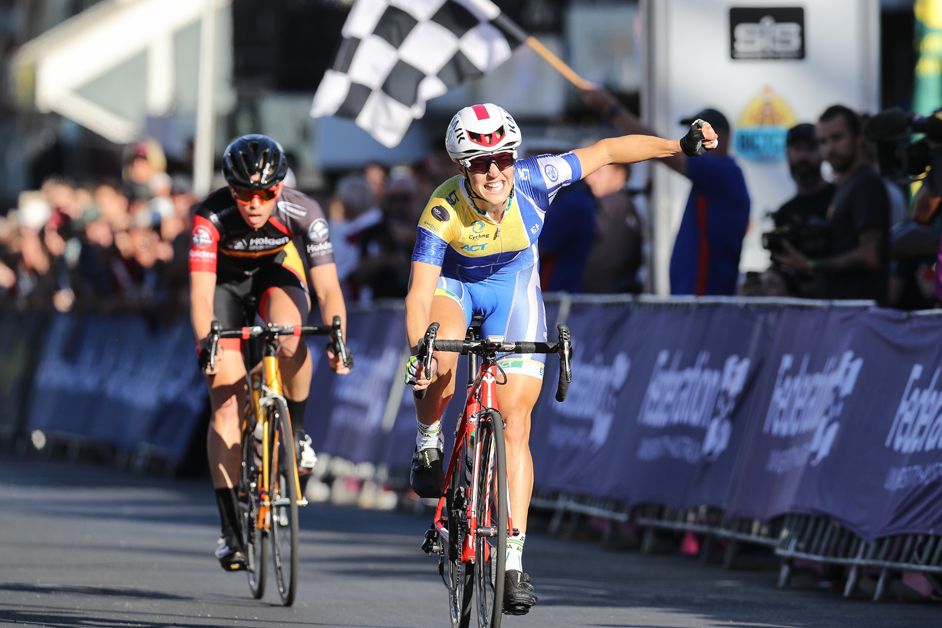 Rebecca Wiasak celebrates her victory