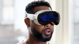 A still from a YouTube video showing a man with his mouth agape while using the Apple Vision Pro VR headset