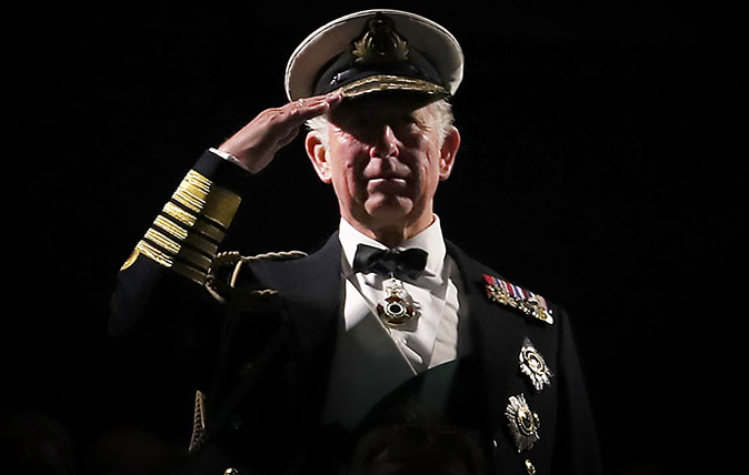 The Prince of Wales, known as the Duke of Rothesay in Scotland, takes the salute during the Royal Edinburgh Military Tattoo at Edinburgh Castle. (©Jane Barlow/PA)