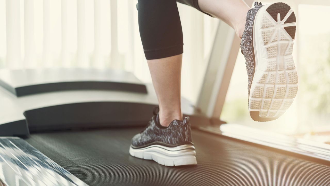 Best cheap treadmills: image shows runner&#039;s feet on treadmill